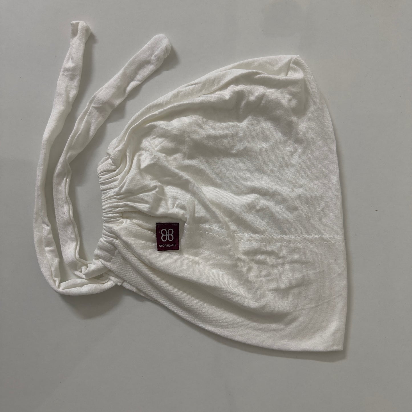 Adjustable Tie-Back Cap