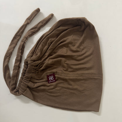 Adjustable Tie-Back Cap