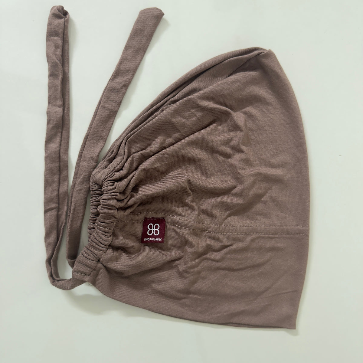 Adjustable Tie-Back Cap