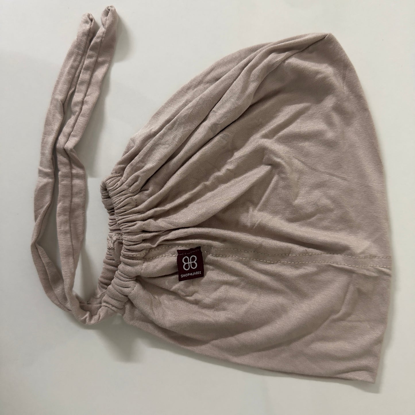 Adjustable Tie-Back Cap