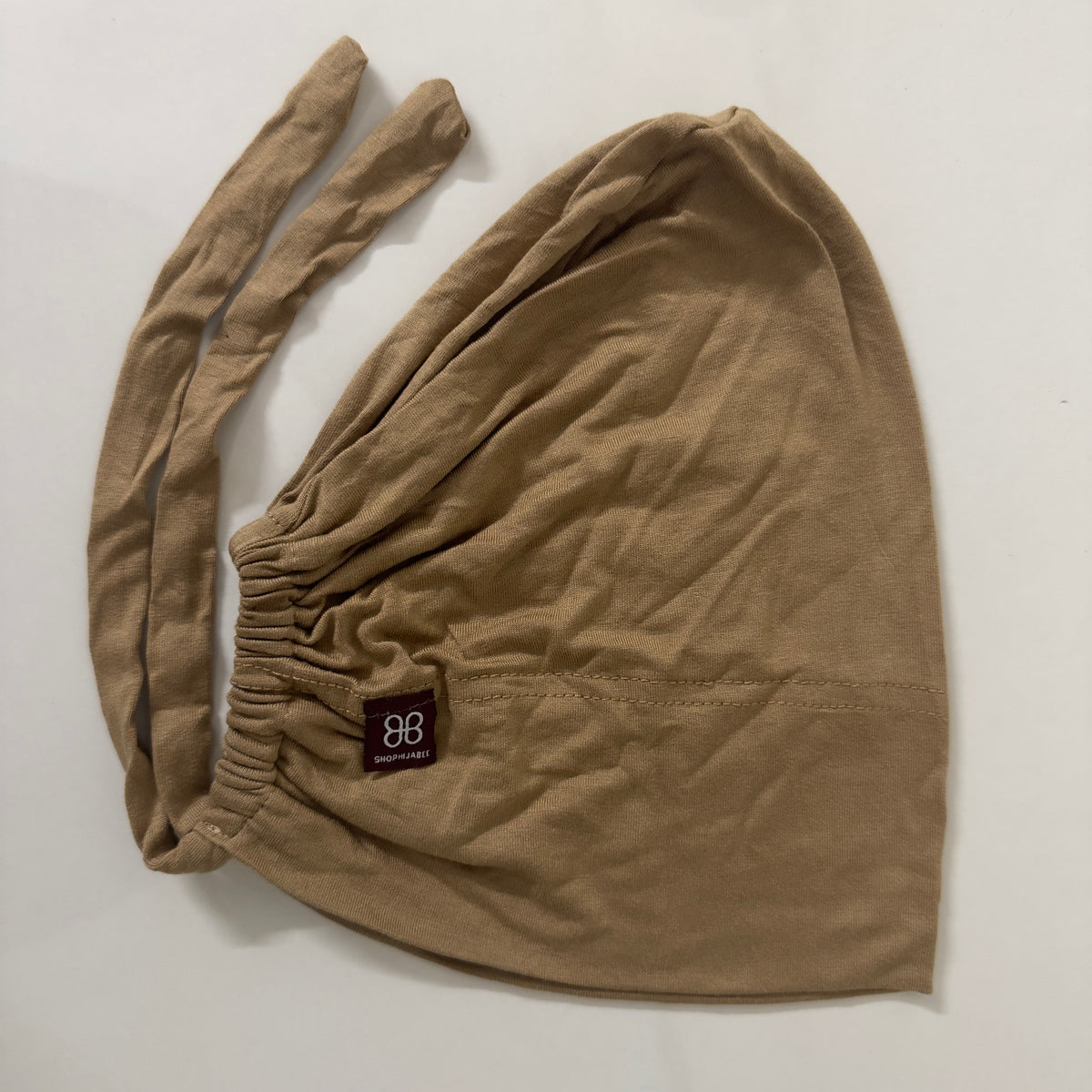 Adjustable Tie-Back Cap