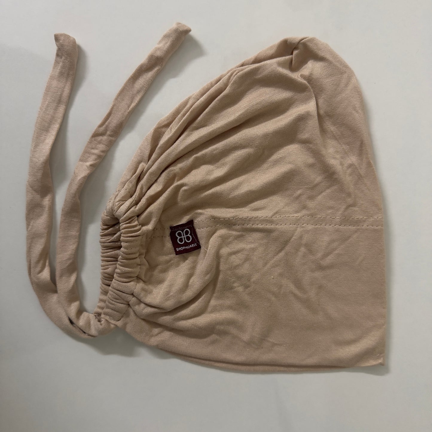 Adjustable Tie-Back Cap