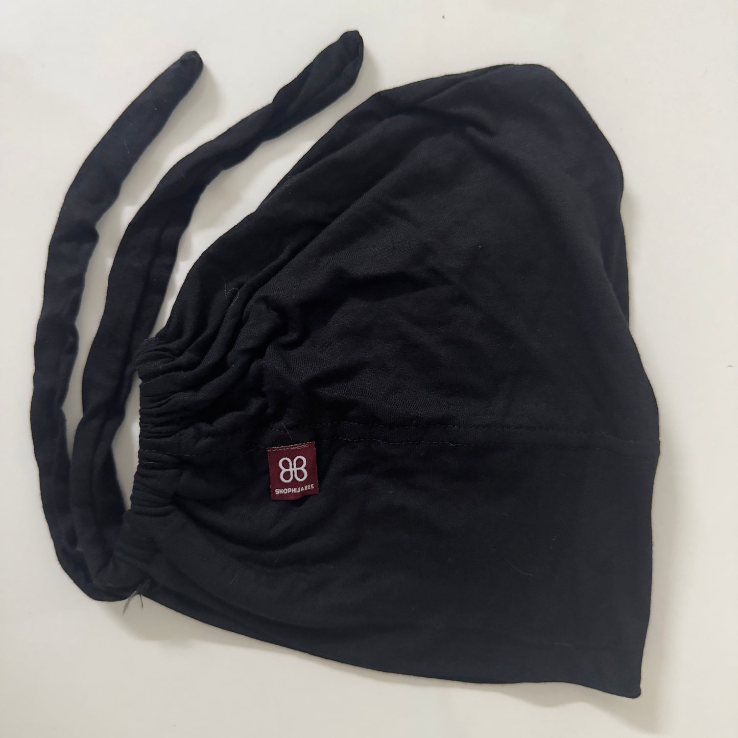Adjustable Tie-Back Cap